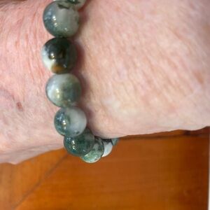 bracelet in fascinating shades of blue, green & ivory, 6-1/2" stretch.